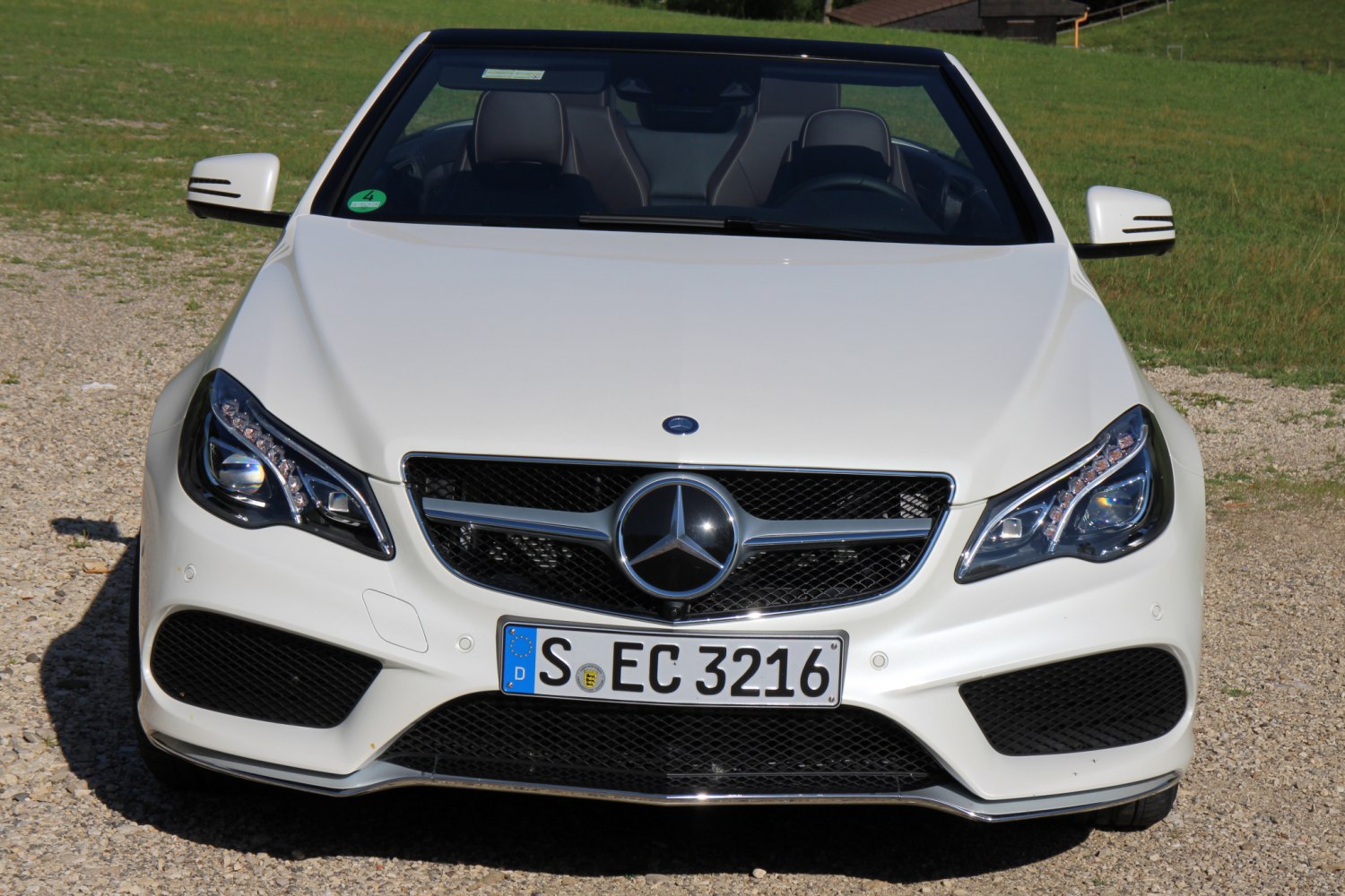 Front view with distinctive grille and headlight design