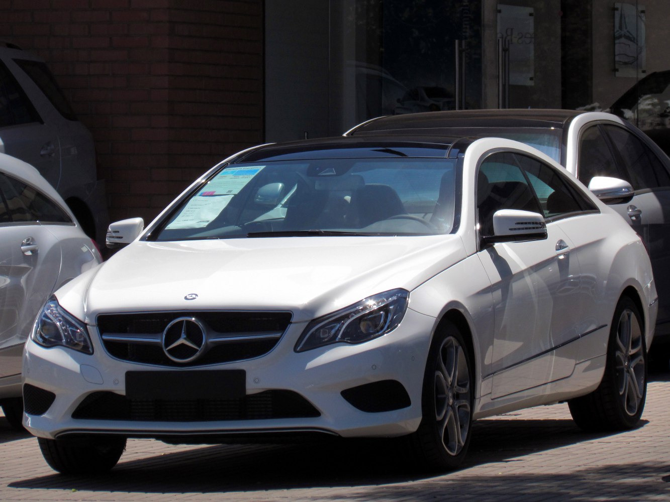 Front view with distinctive grille and headlights