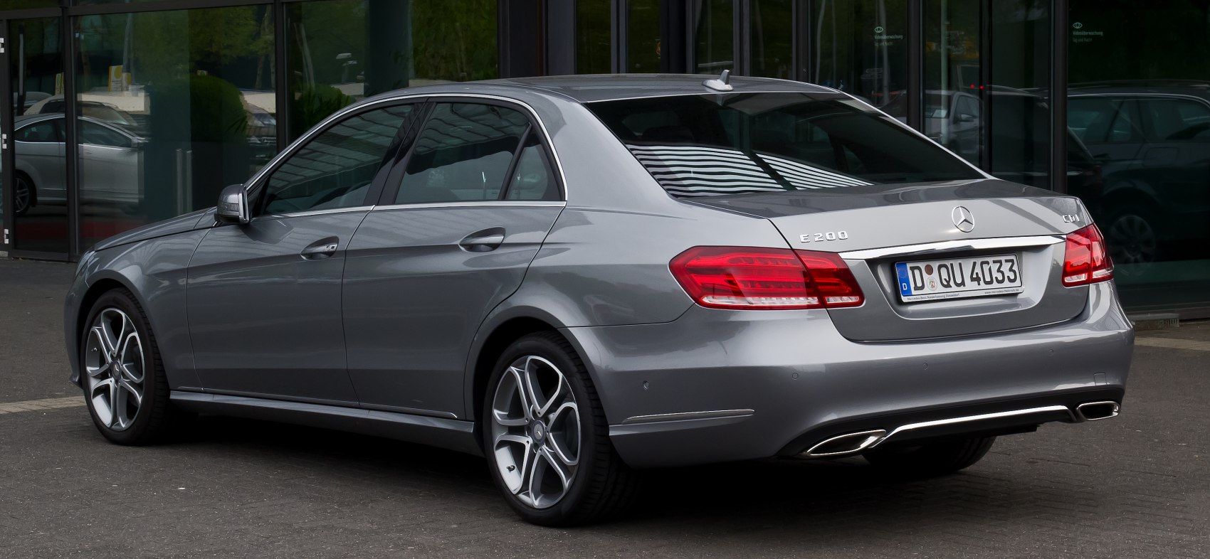Rear and side with LED taillights, alloy wheels, exhaust pipes