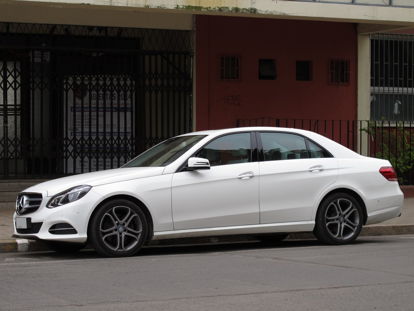 Side profile of sedan with sporty alloy wheels