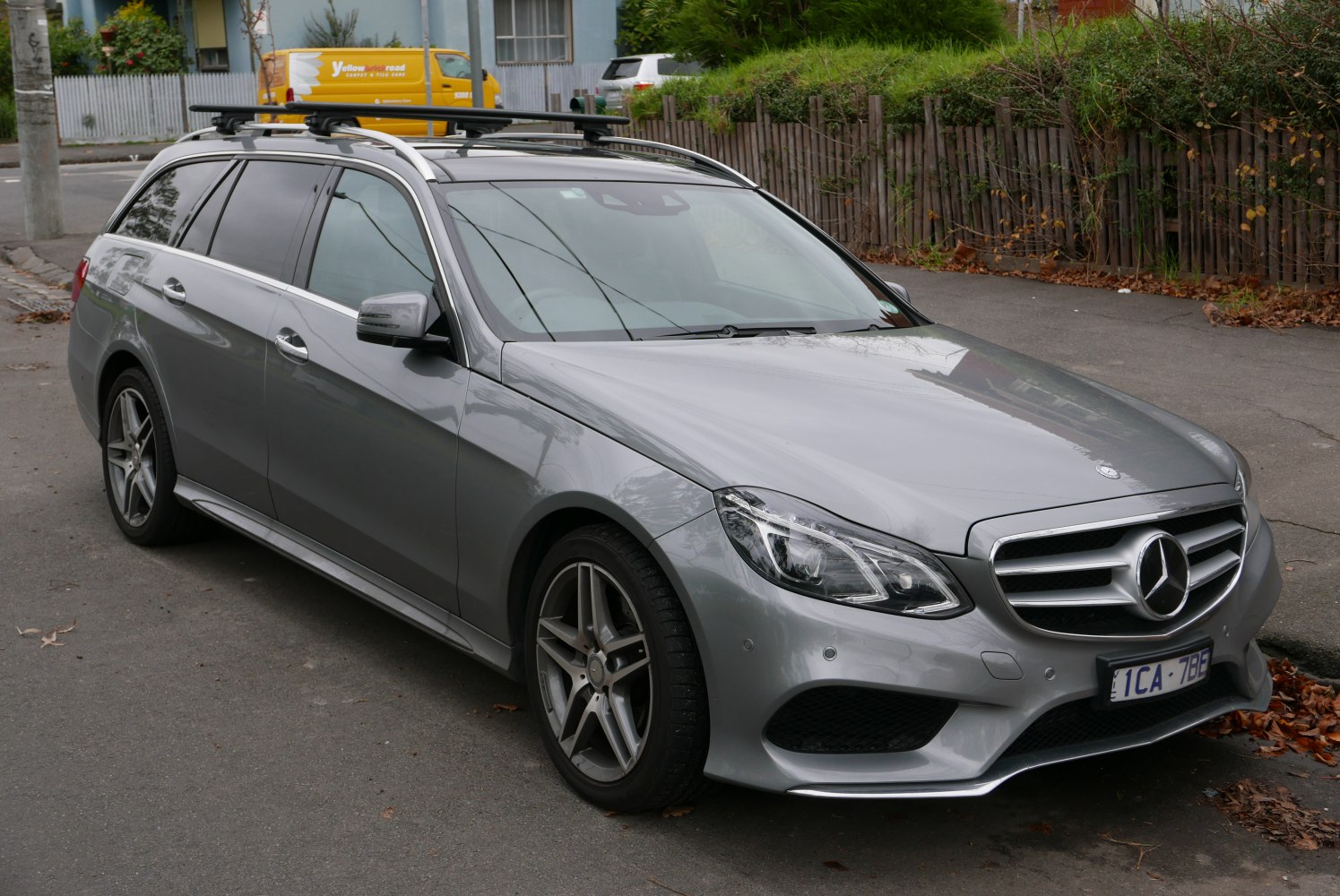 Silver station wagon with roof rails and alloy wheels