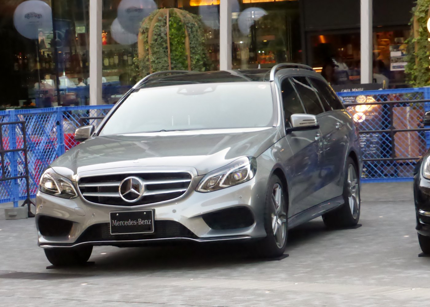 Silver station wagon with front grille and headlights