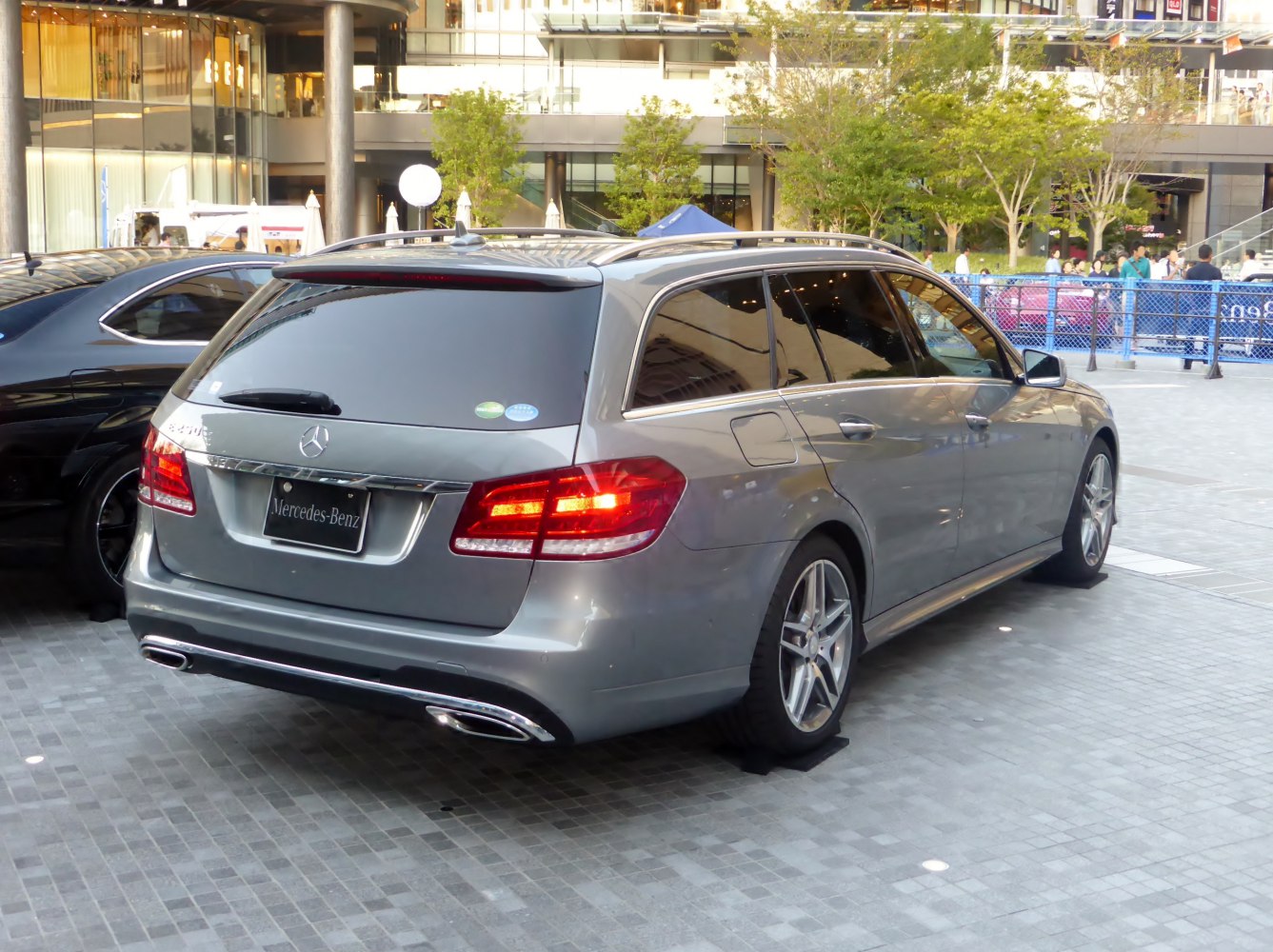 Silver station wagon rear with LED tail lights and dual exhaust