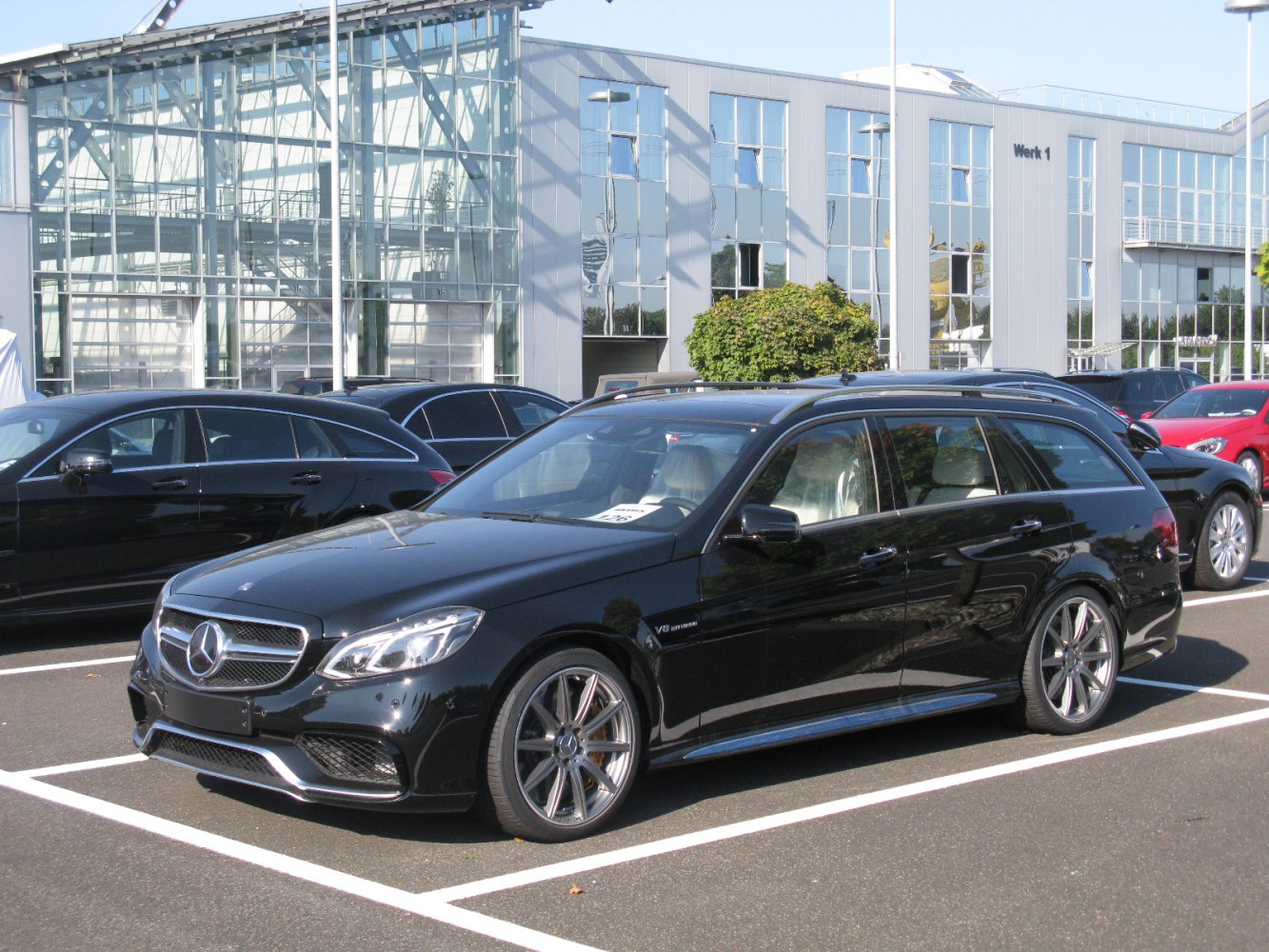 Black station wagon with sporty alloy wheels and V8 biturbo badge