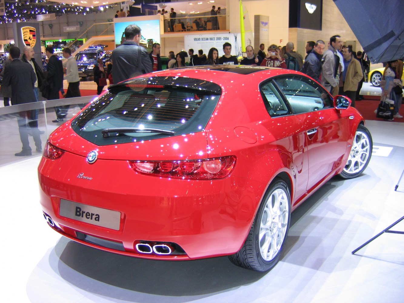 Rear view of sporty hatchback with distinct taillights and dual exhaust