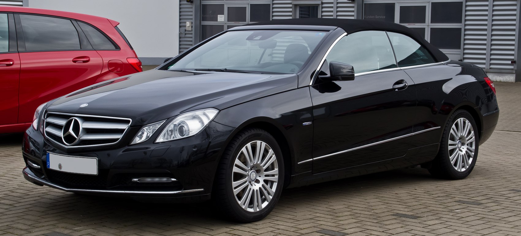 Black convertible with alloy wheels and soft top