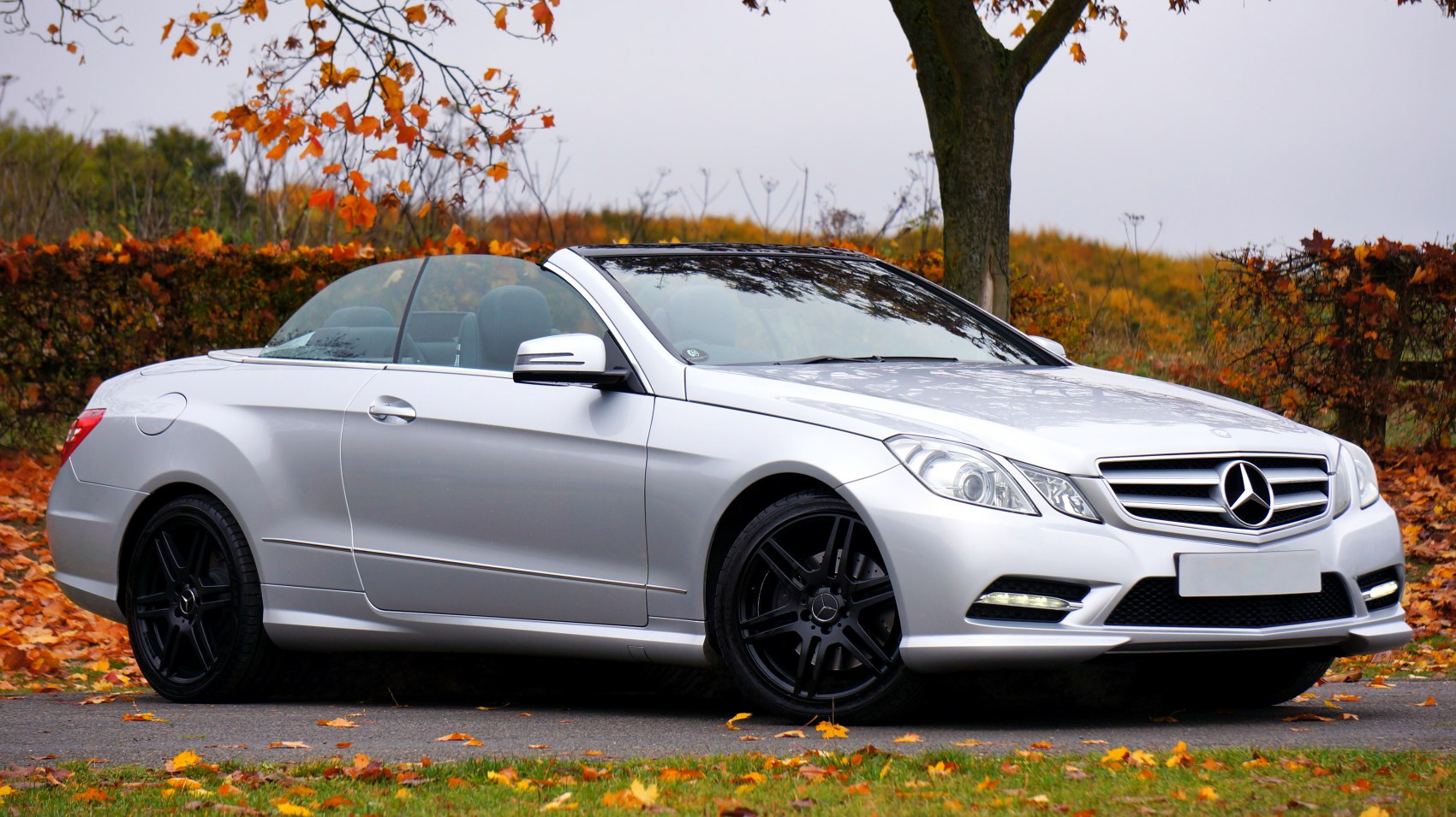 Silver convertible with retractable roof and black alloy wheels