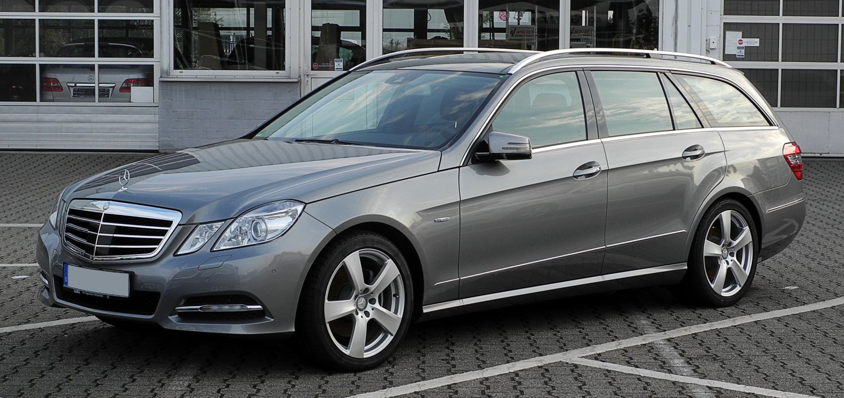 Mid-size luxury station wagon with alloy wheels and roof rails