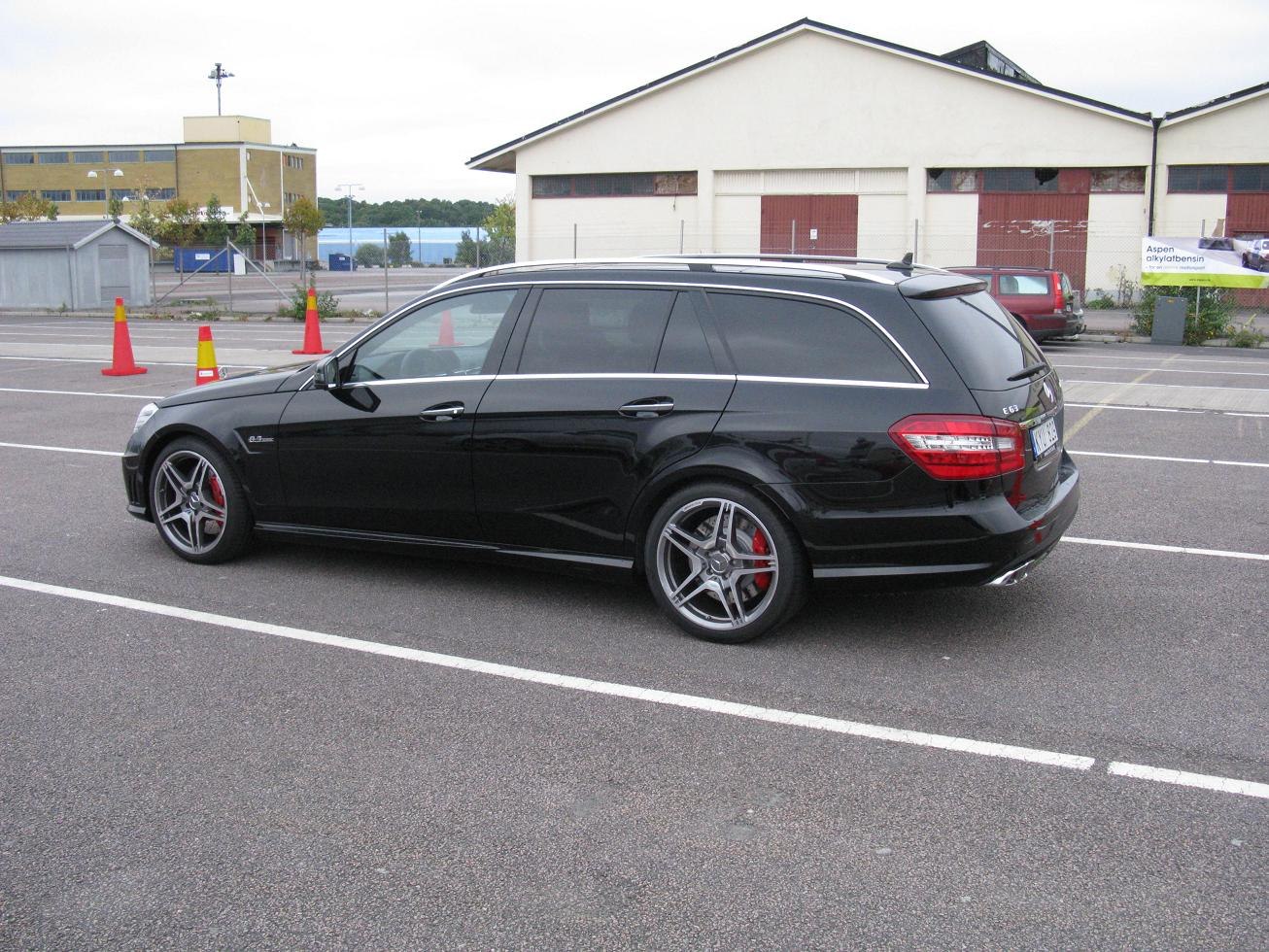 Sporty black station wagon with chrome trim and alloy wheels