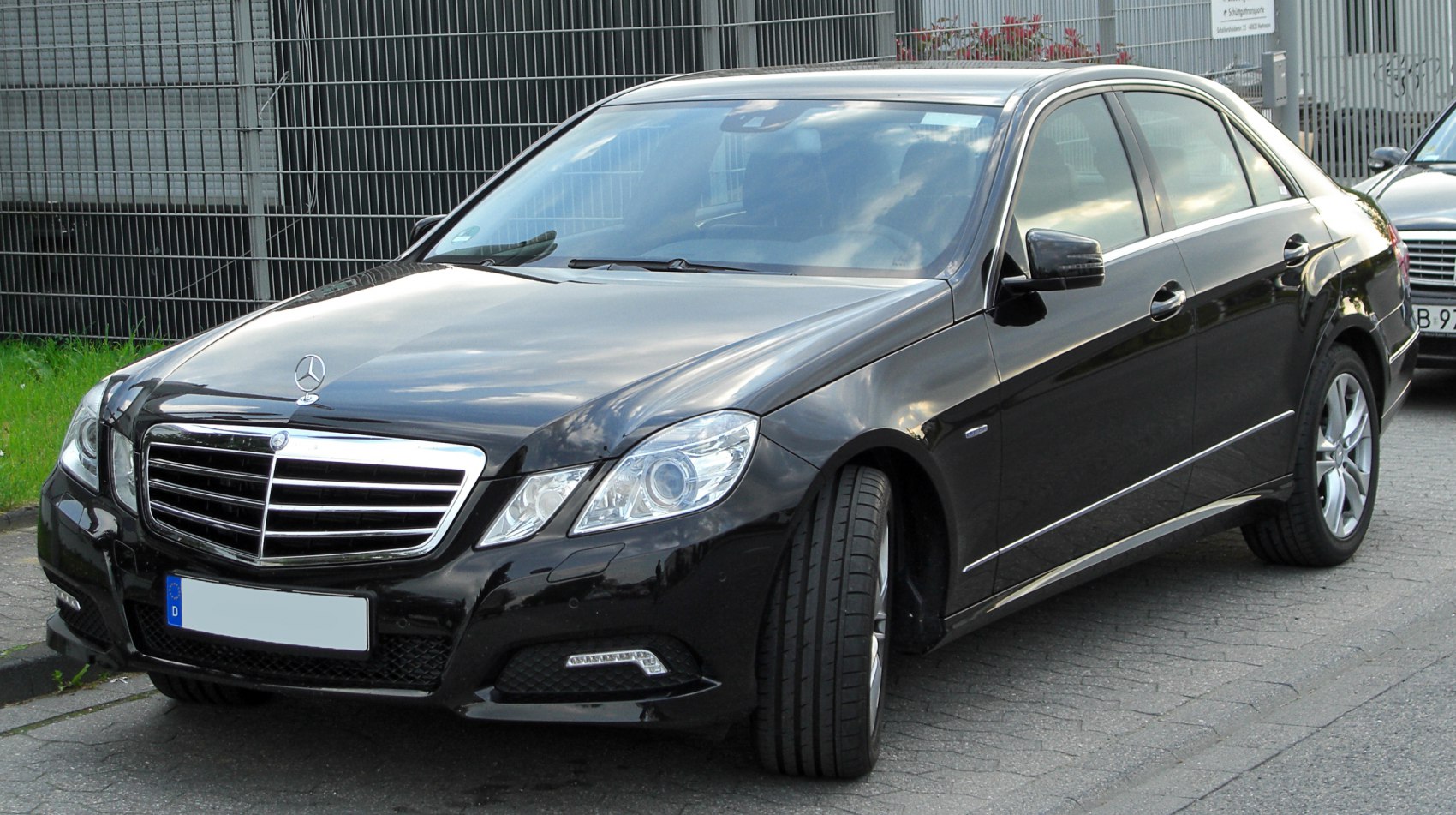 Front view with chrome grille and headlights