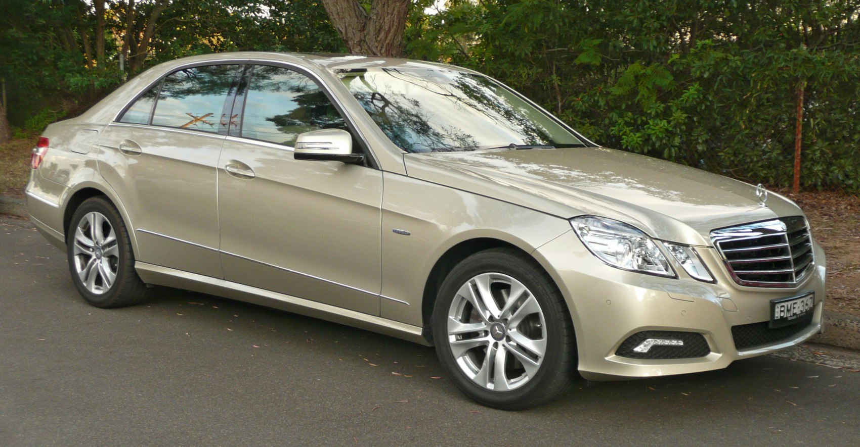 Luxury sedan with front grille and LED fog lights