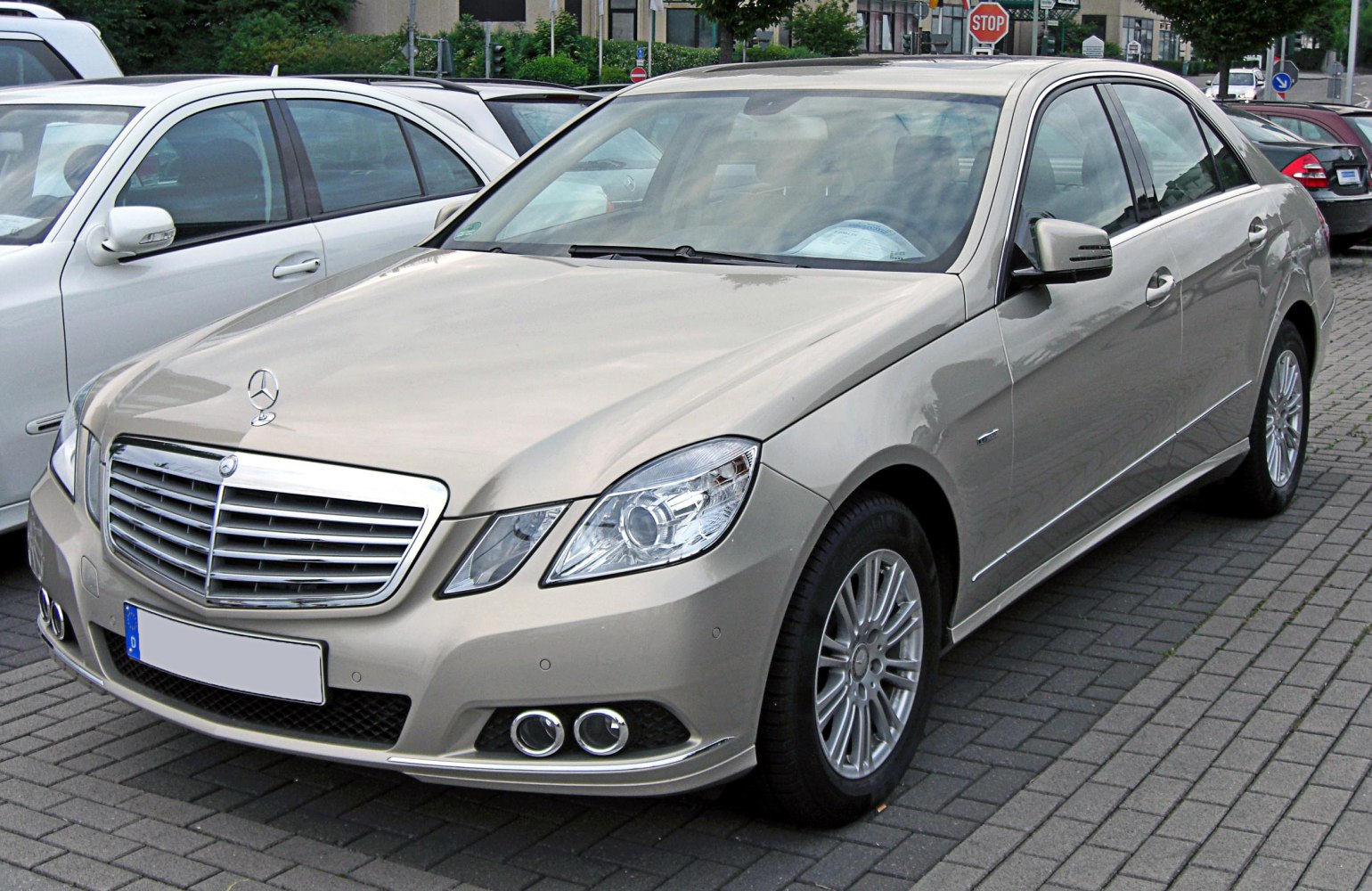 Front and side view with chrome grille and dual round fog lights