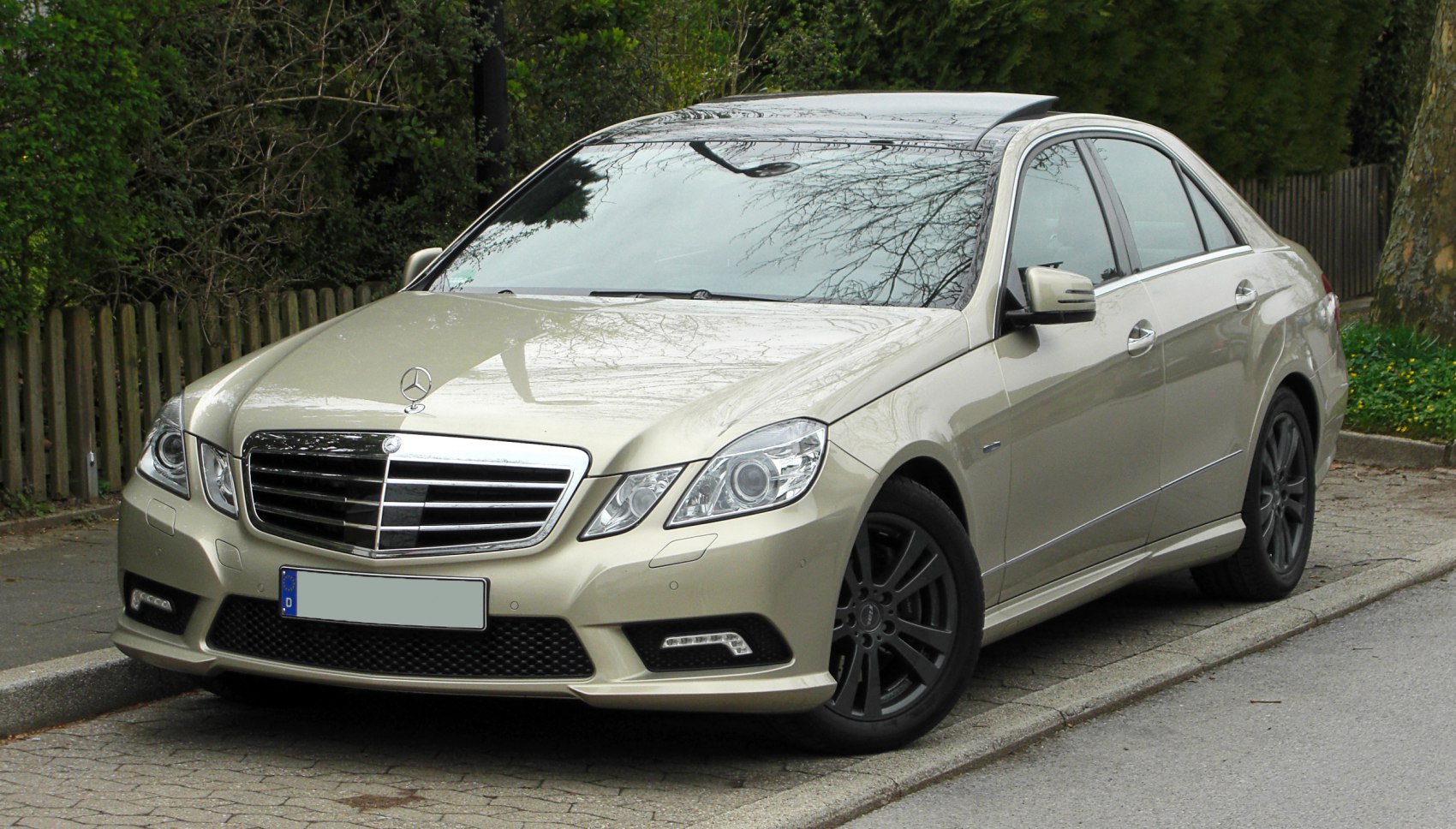 Front grille and headlights view of a luxury sedan.