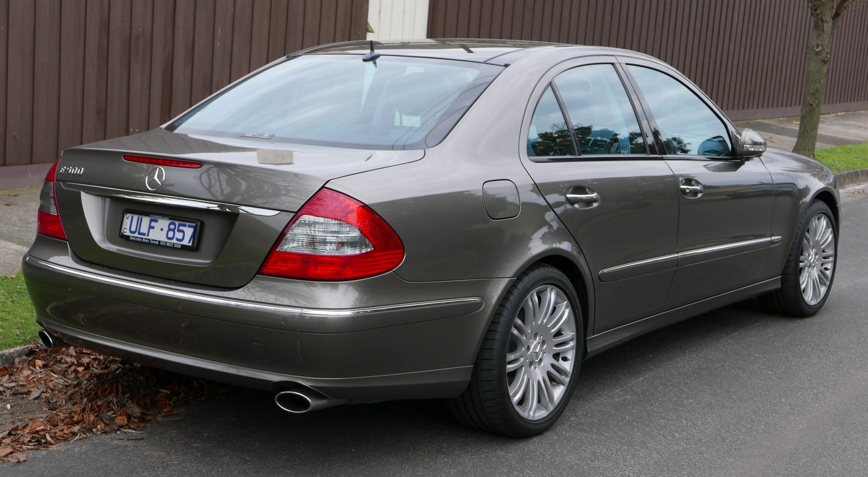 Rear view of sedan with twin exhaust and distinctive taillights