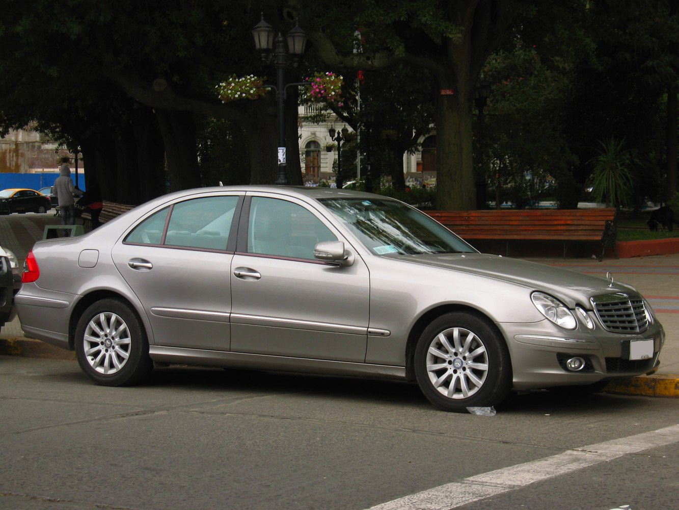Silver sedan side profile with alloy wheels and facelift design elements