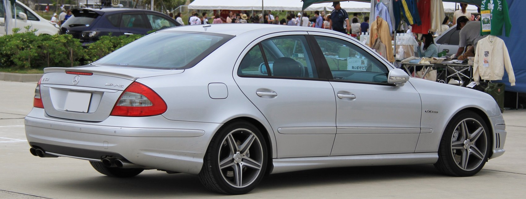 Rear side view with quad exhaust and alloy wheels