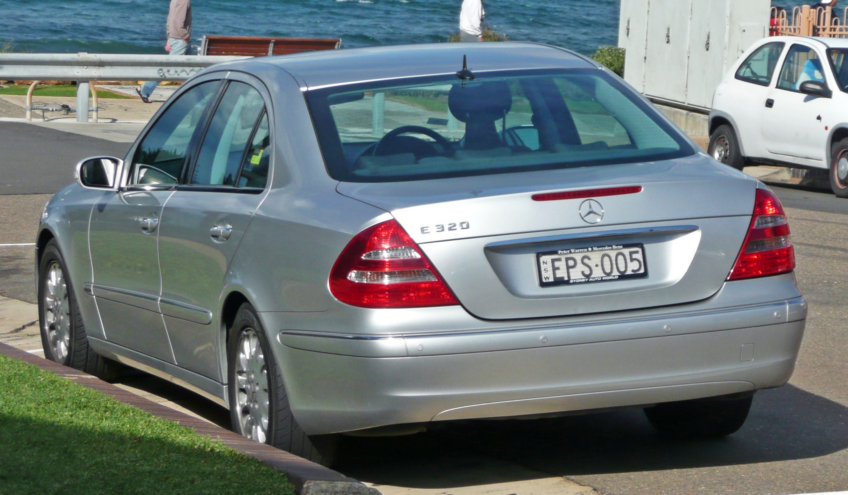 Silver sedan rear with distinct taillights and trunk shape
