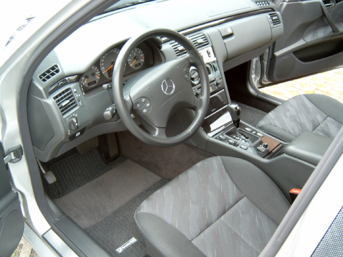 Dashboard, steering wheel, and center console of a car interior