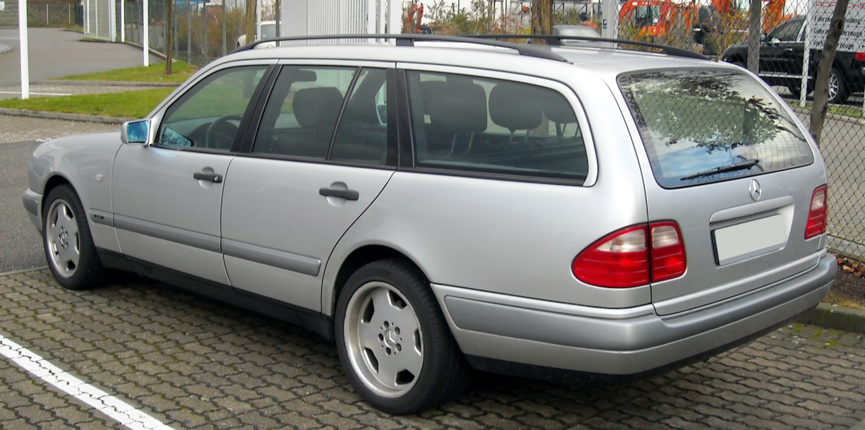 Silver estate car with roof rails and five-spoke alloy wheels