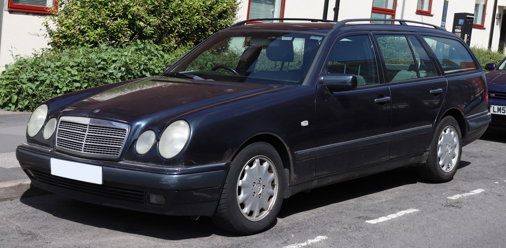Station wagon with quad round headlights and alloy wheels