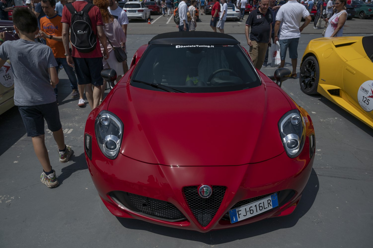 Front view with iconic headlights and Alfa Romeo grille