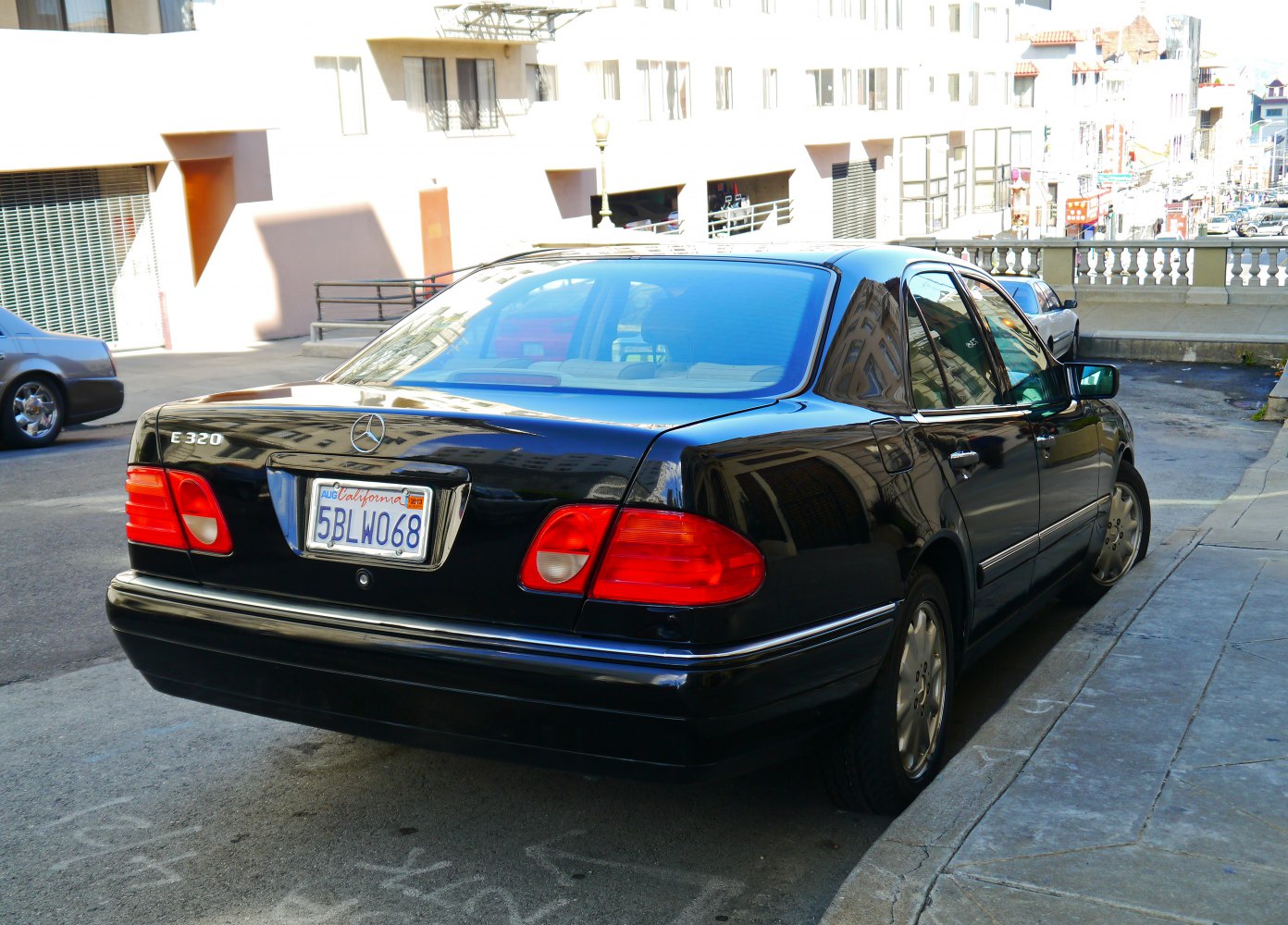 Rear view of classic luxury sedan with distinctive rear lights