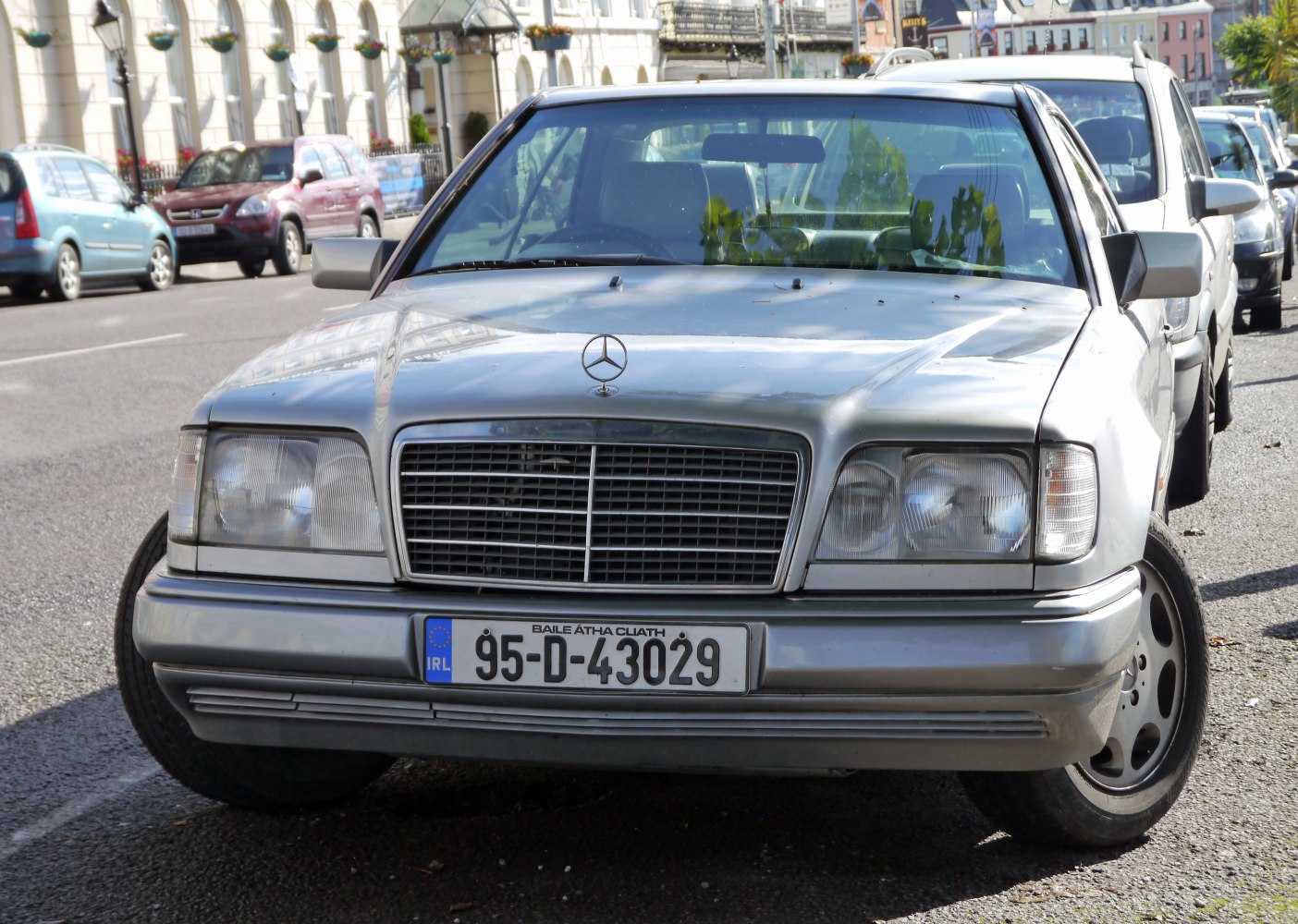Front view of car with iconic grille and rectangular headlights