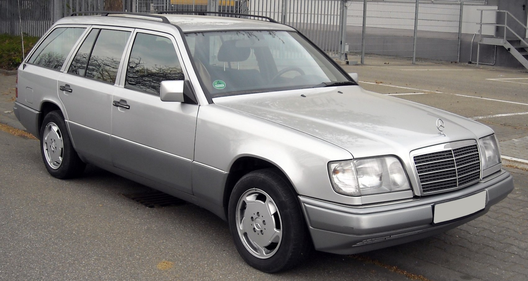 Silver station wagon with chrome grille and alloy wheels