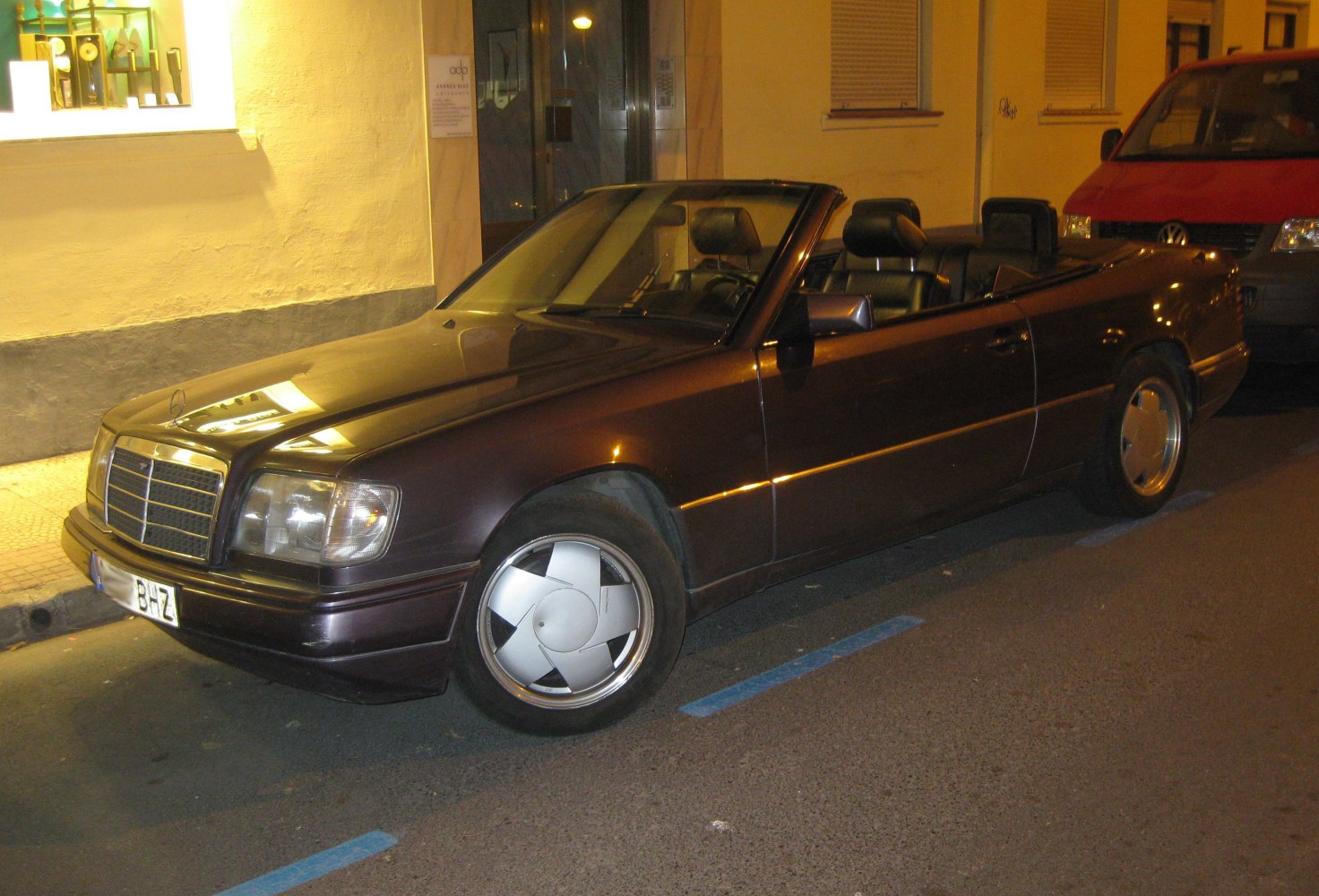 Convertible with distinctive wheel design and vintage front end