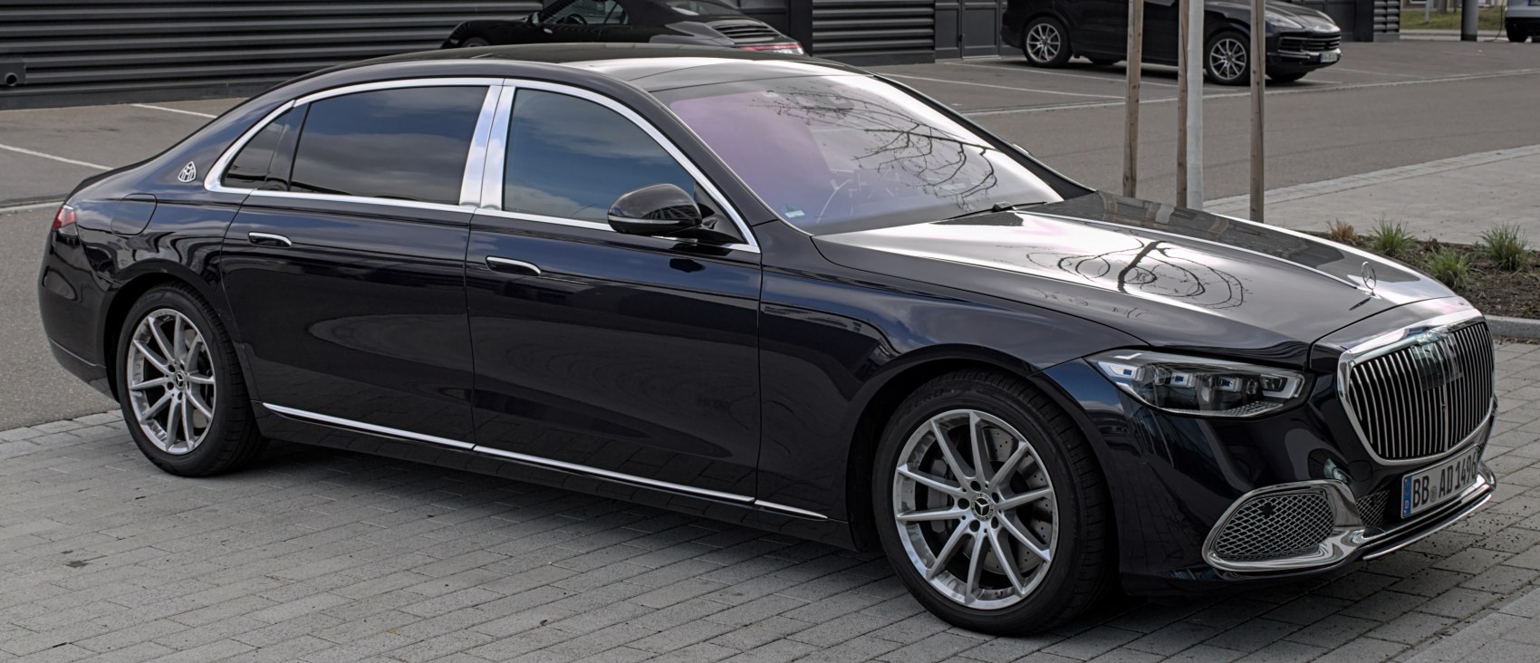 Luxury sedan with vertical grille and chrome trim