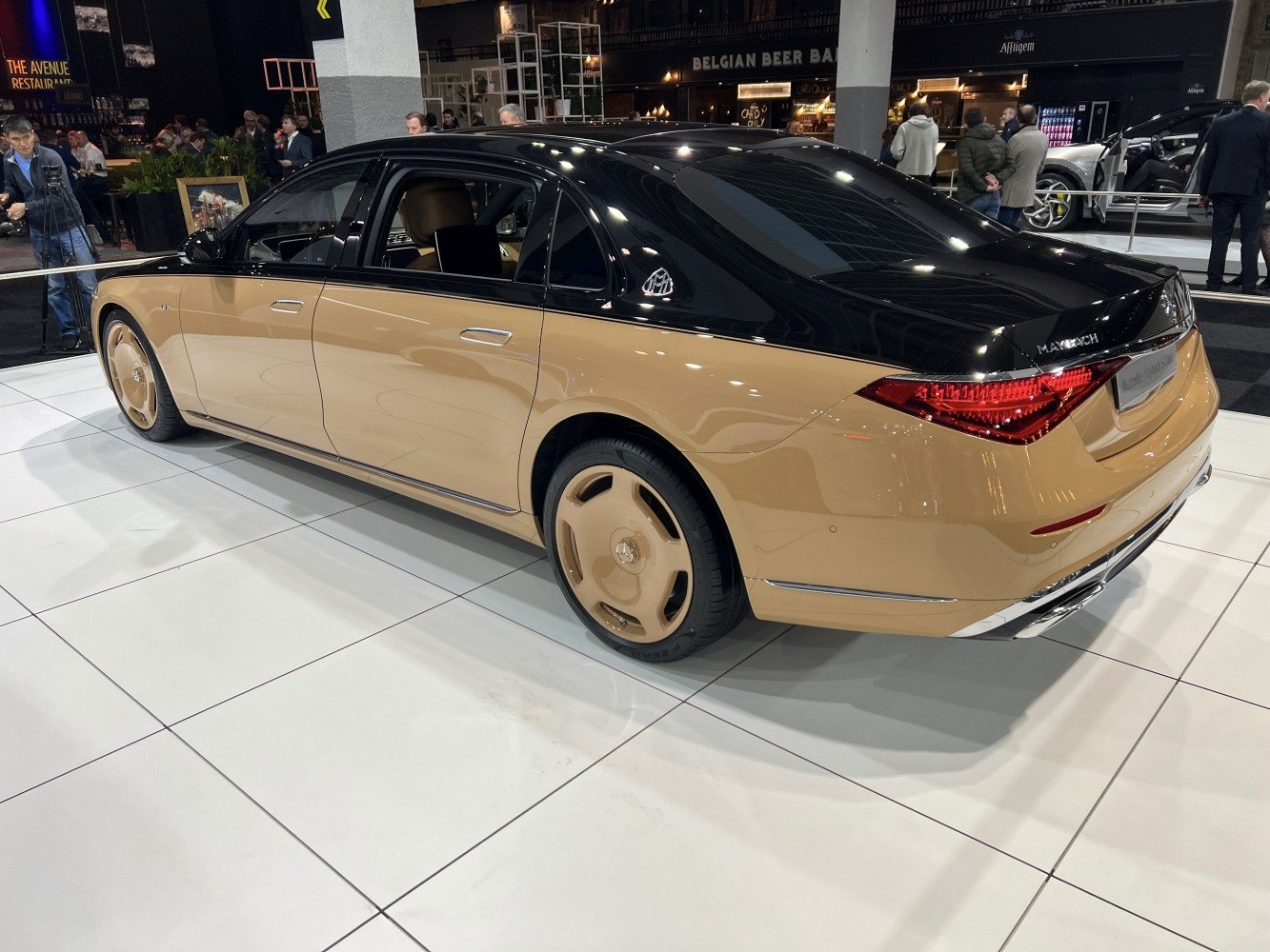 Luxury sedan with two-tone paint and custom wheels