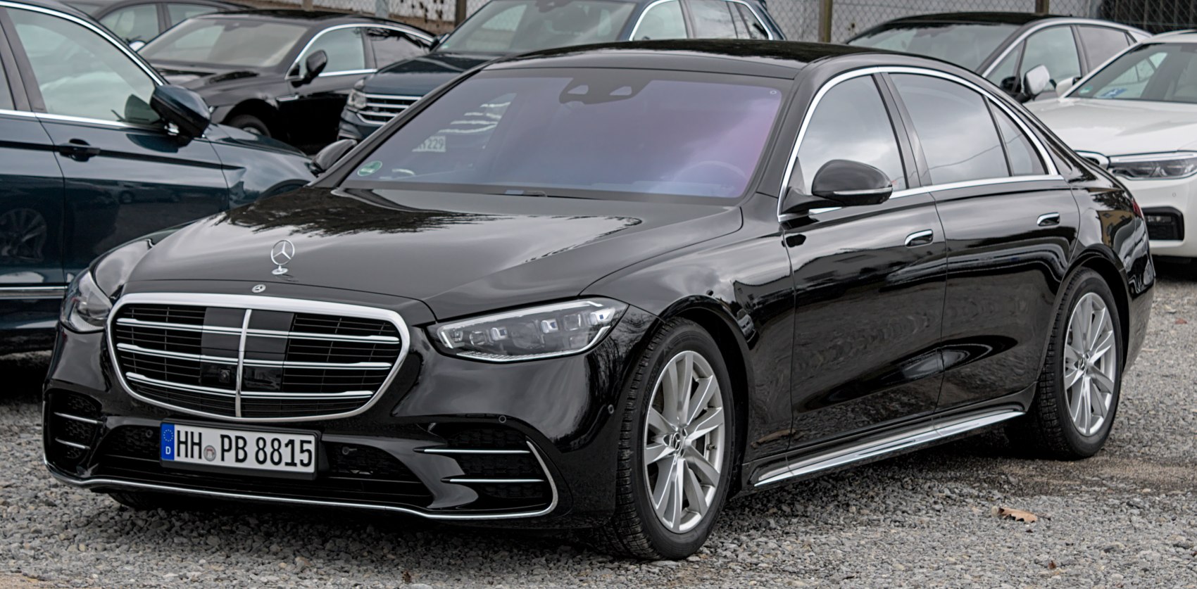 Front grille and alloy wheels of a luxury sedan