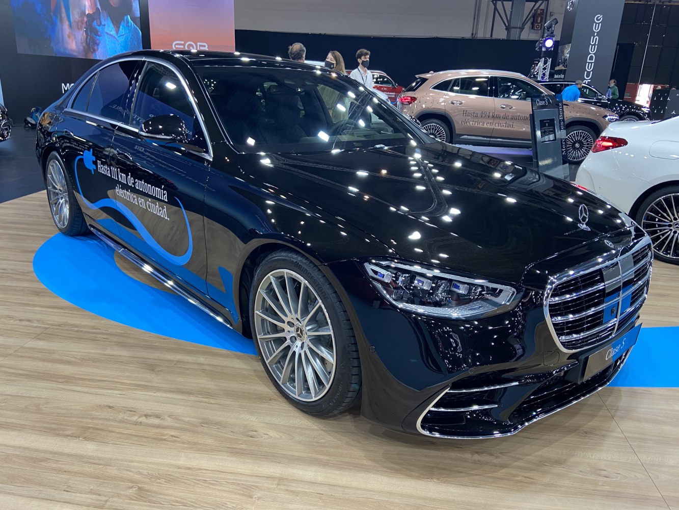 Luxury sedan with LED headlights and multi-spoke alloy wheels