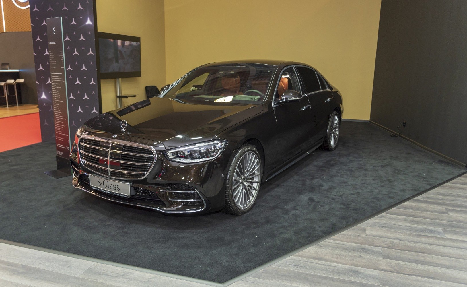 Luxury sedan with LED headlights and large chrome grille