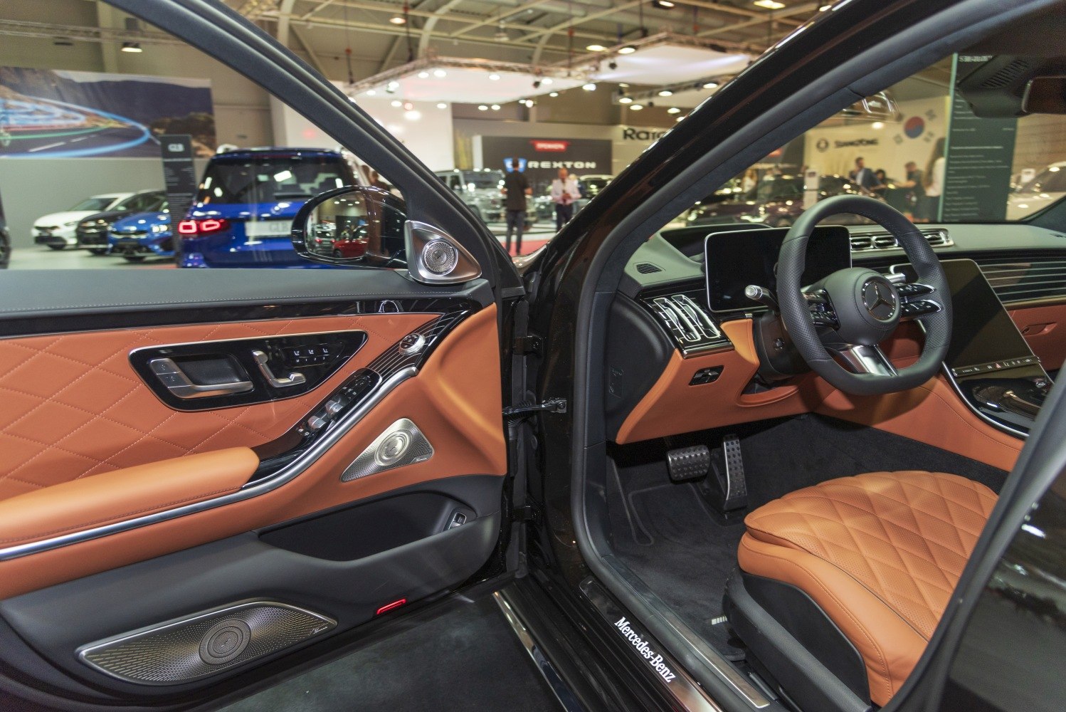 Luxury interior with quilted leather seats and premium door panel design