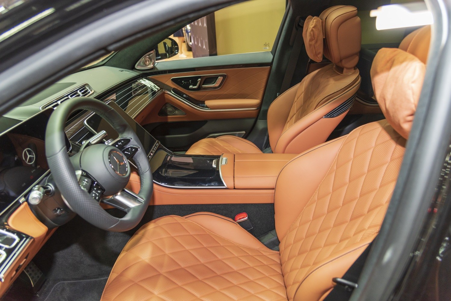 Quilted leather seats and advanced digital dashboard with steering wheel and center console