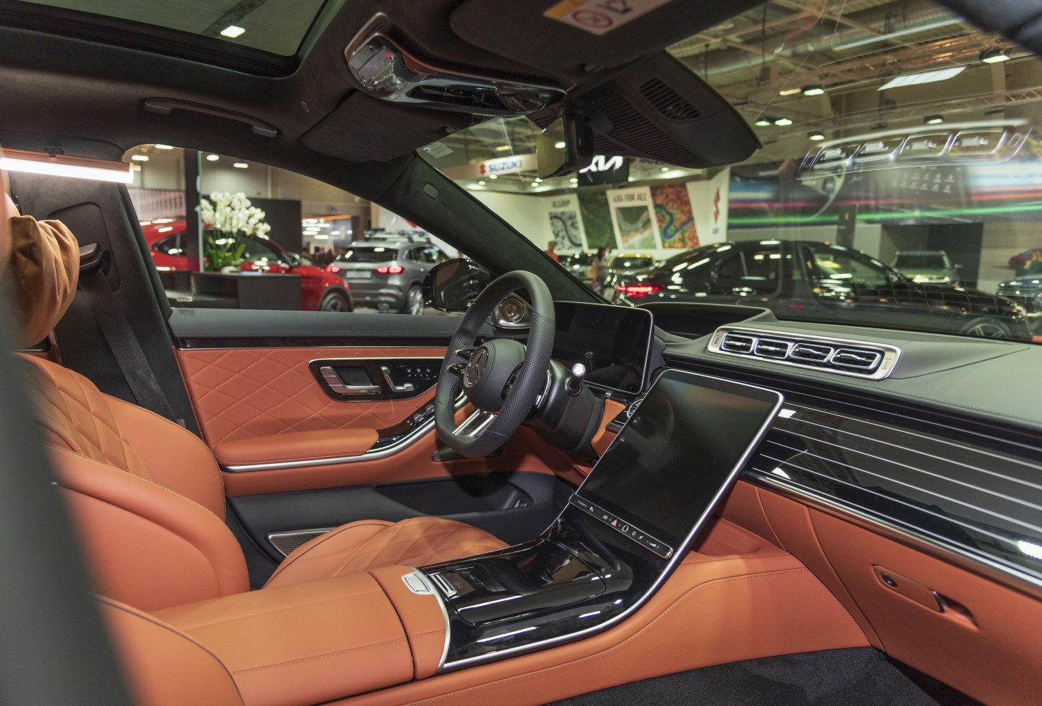 Luxury interior with quilted leather seats and dual digital displays
