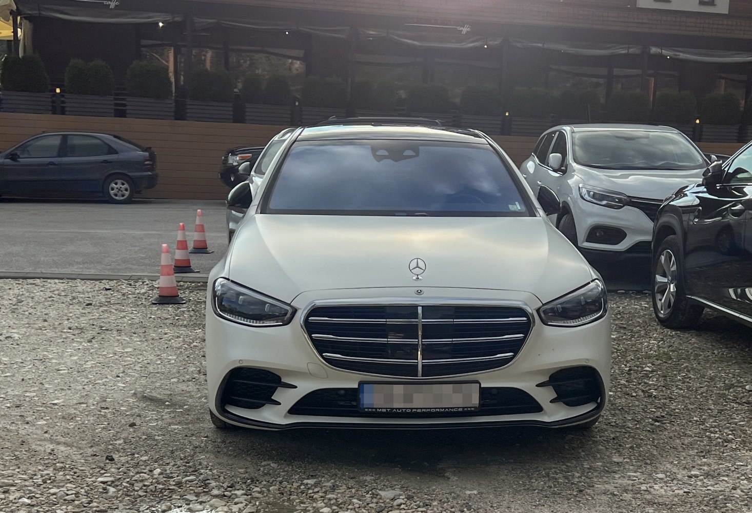 Close-up of front grille and headlights of a luxury sedan