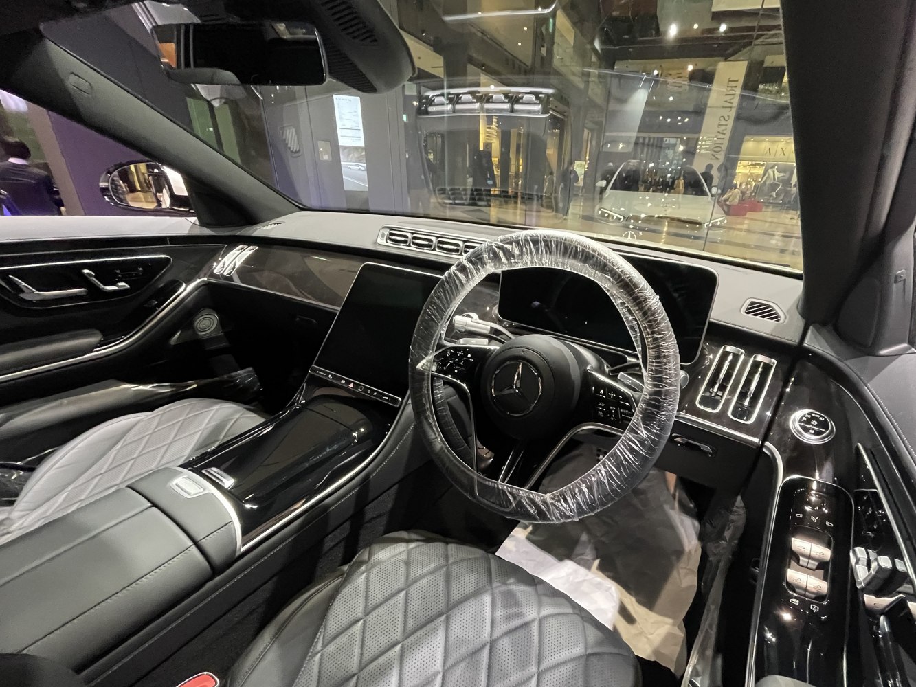 Luxury car interior with modern digital dashboard and leather seats