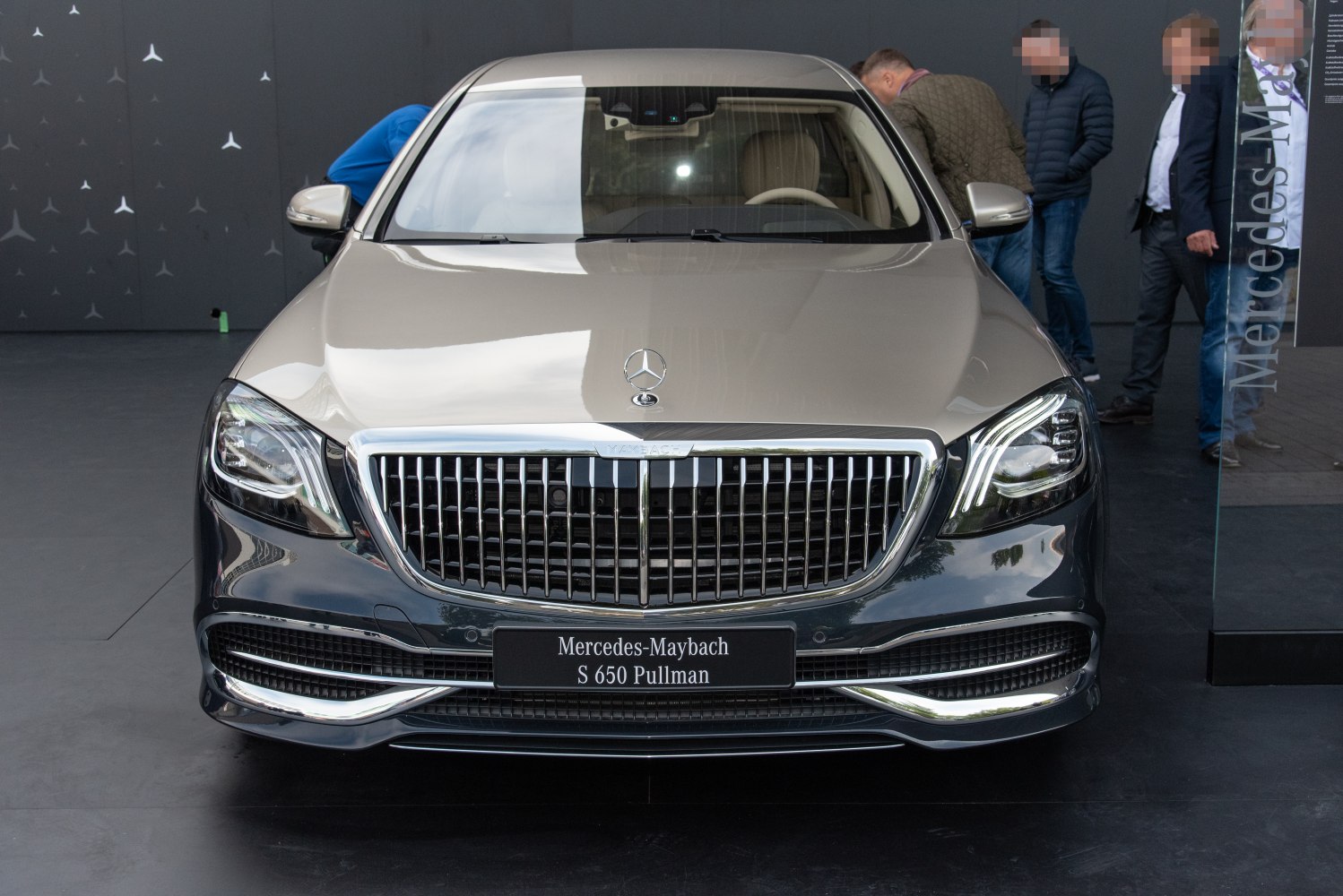 Luxury front grille and LED headlights of a high-end sedan