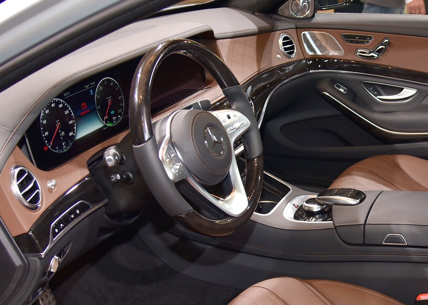 Wood and leather steering wheel with digital instrument cluster