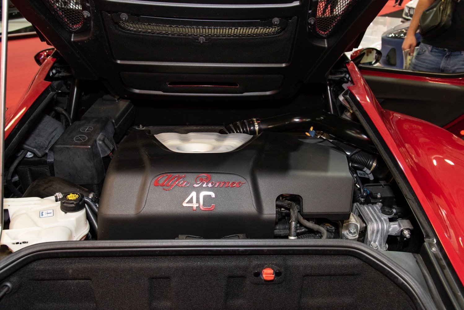 Mid-engine compartment with Alfa Romeo 4C branded engine cover