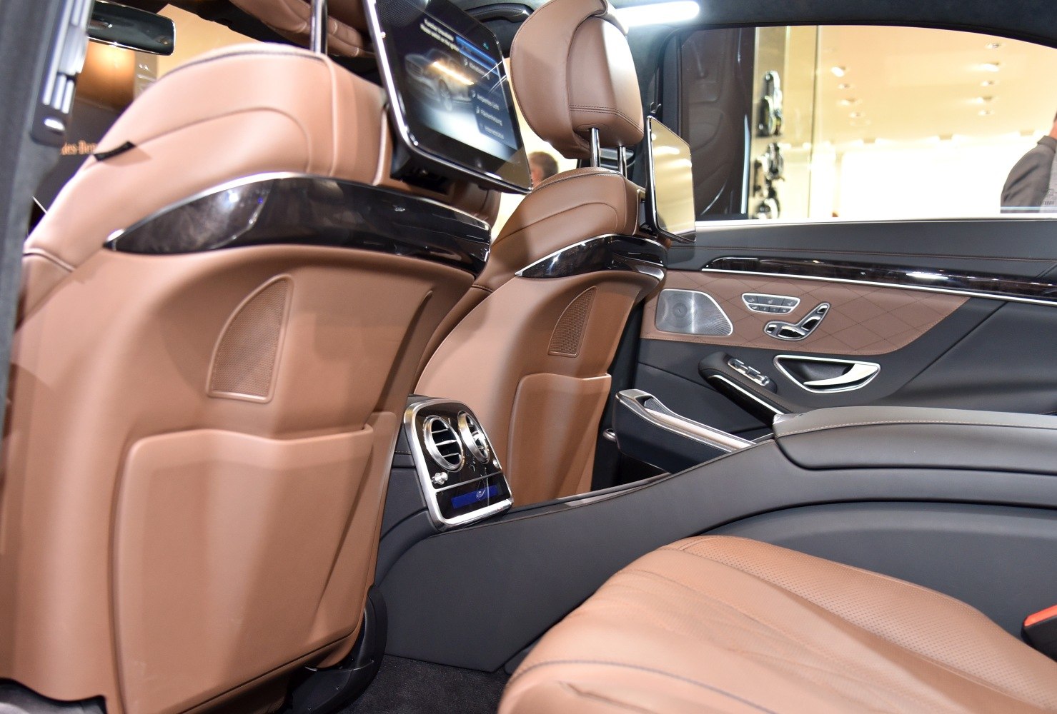 Luxury rear interior with leather seats and rear entertainment screens
