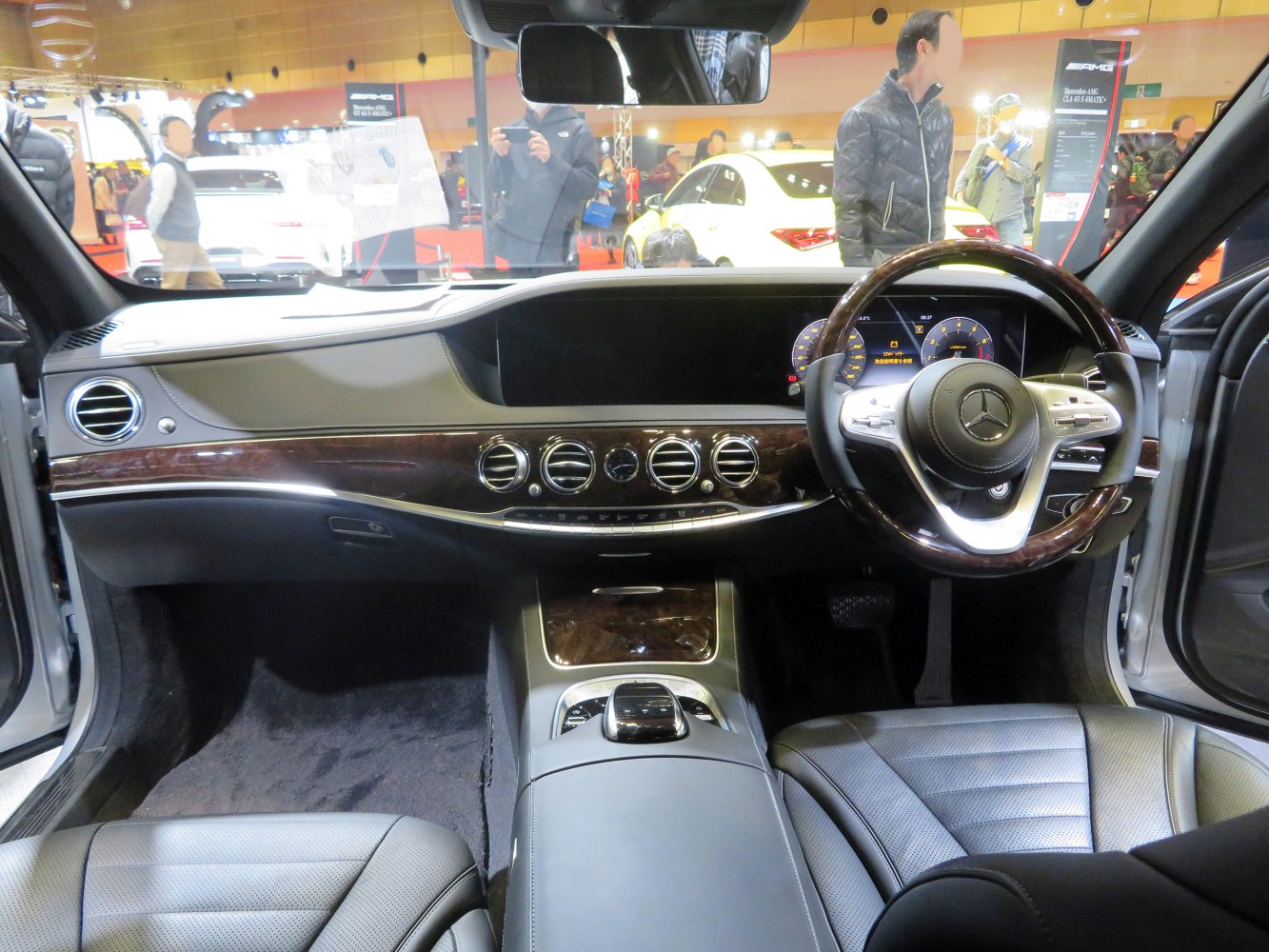 Luxurious dashboard with wood trim and digital instrument cluster