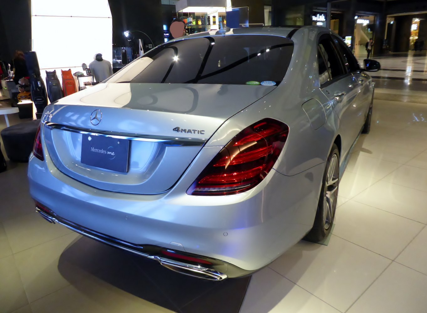 Rear view with 4MATIC badge and tail lights