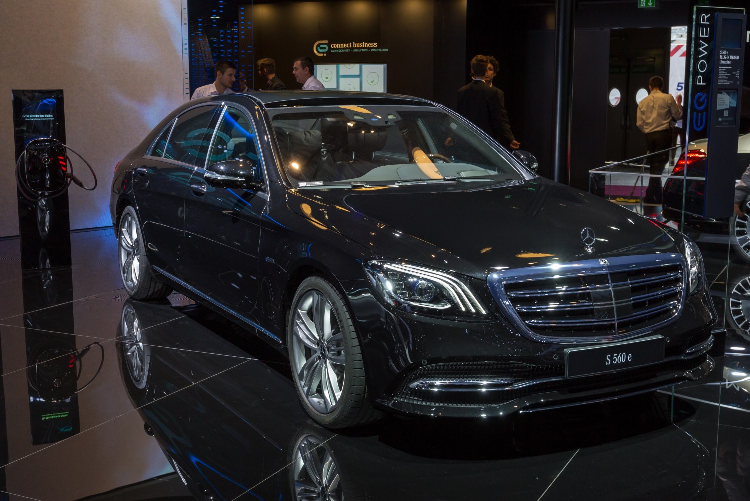 Luxury sedan with LED headlights, chrome grille, and alloy wheels
