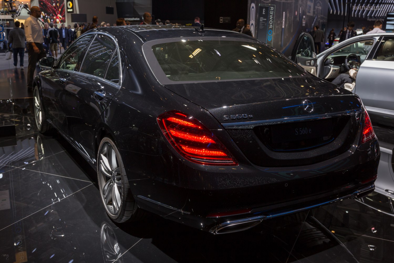 Rear view with illuminated LED taillights and sleek body design