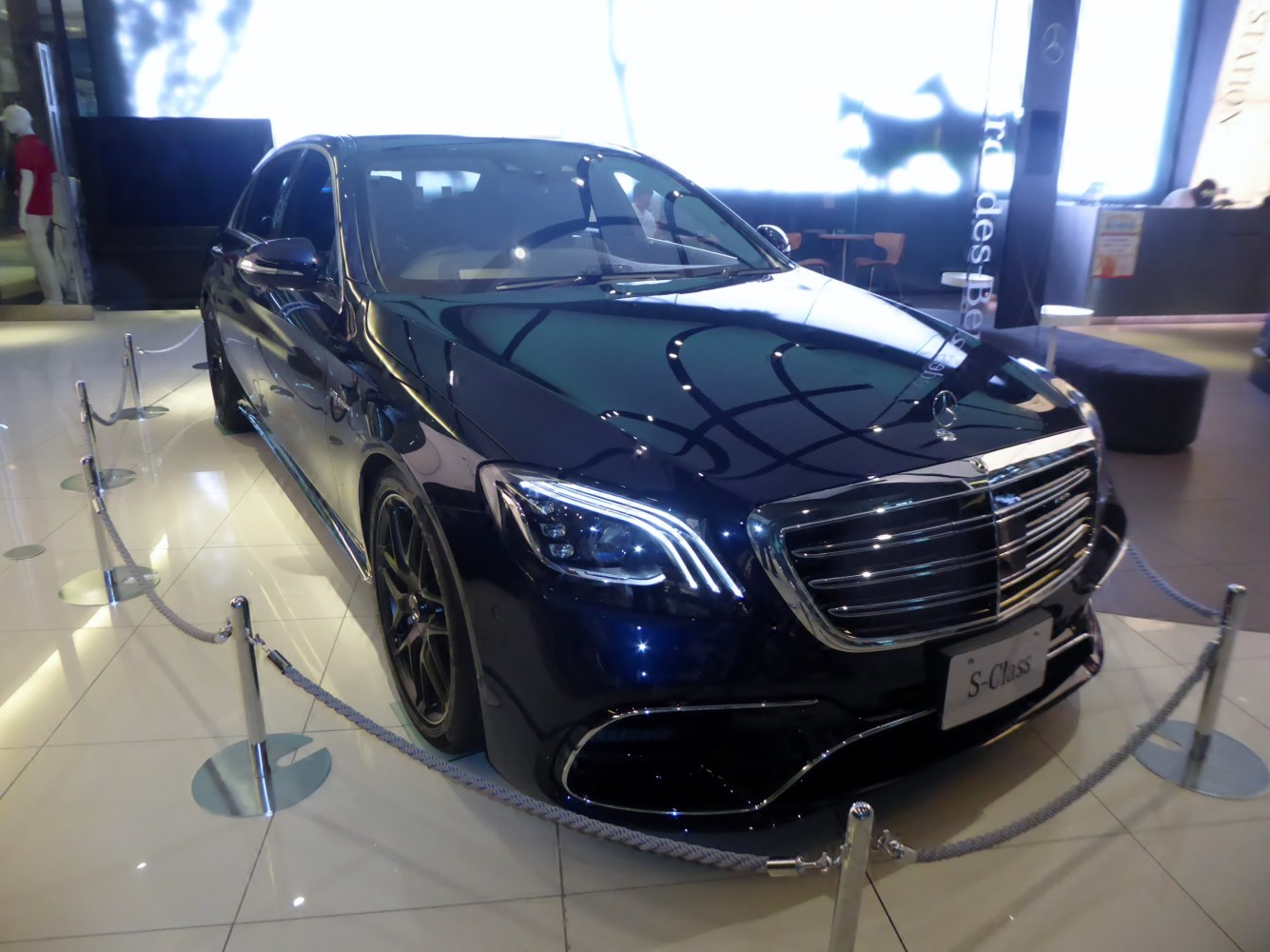 Front grille and LED headlights of luxury sedan