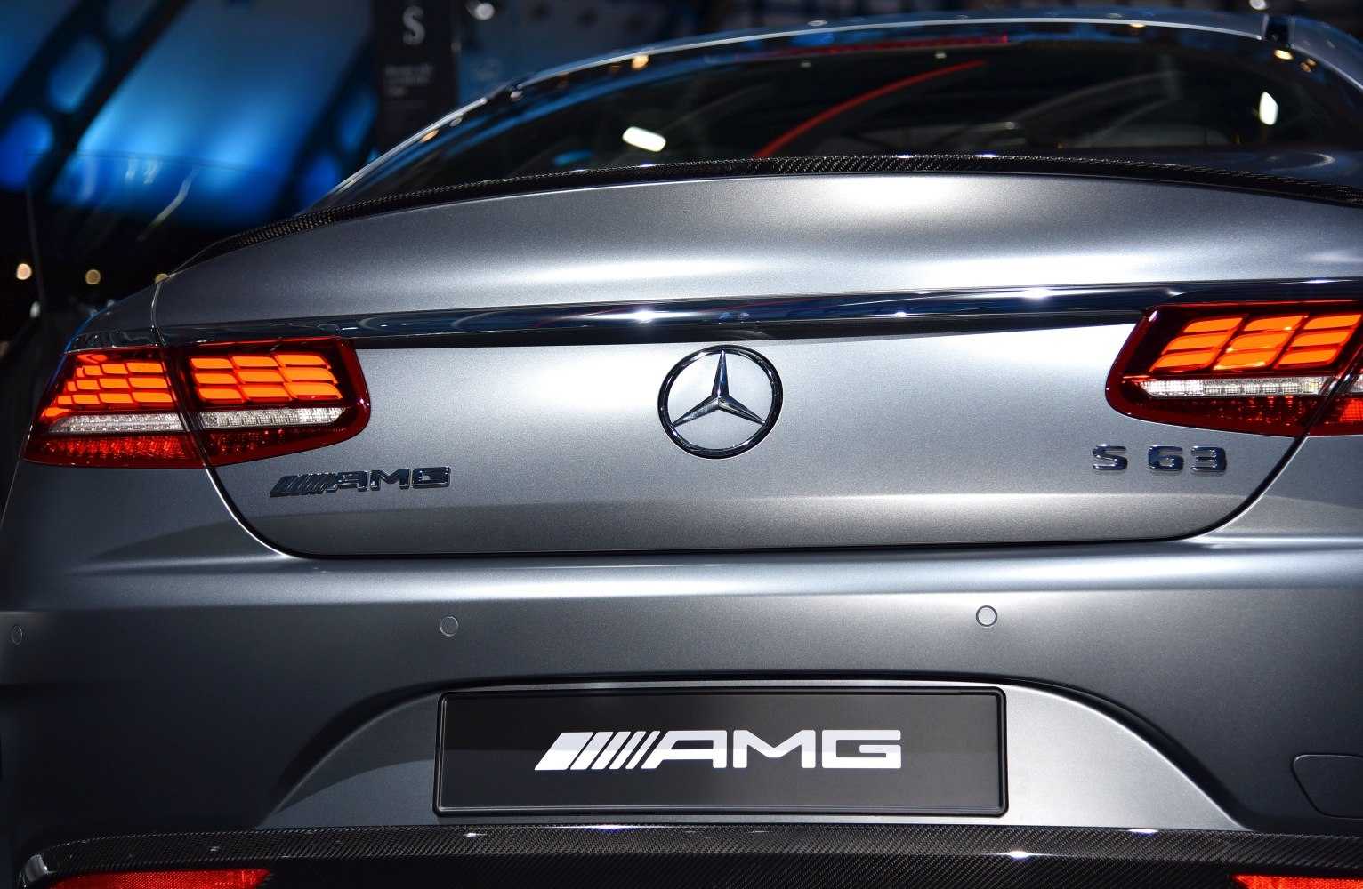 Rear AMG badge and LED tail lights on luxury coupe