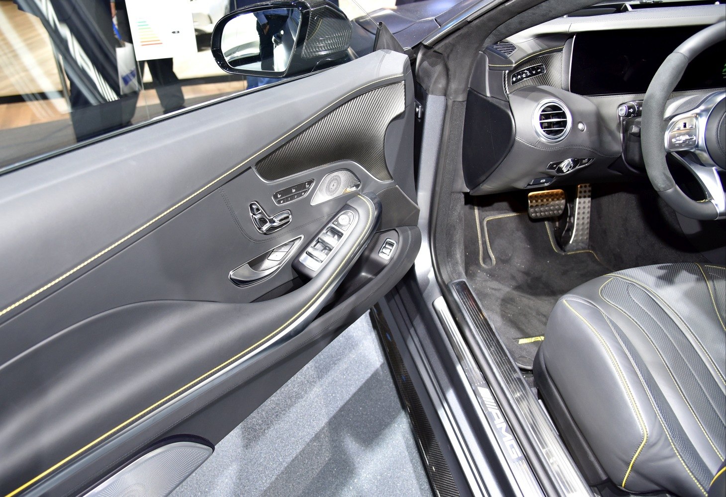 Luxury door panel, driver controls, AMG trim, leather seat with contrast stitching
